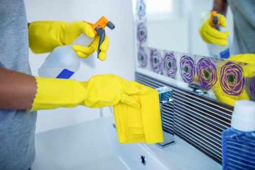 Cleaner completing a final safety-conscious cleaning check